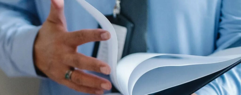 Lawyer that knows Mexican law holding a document.